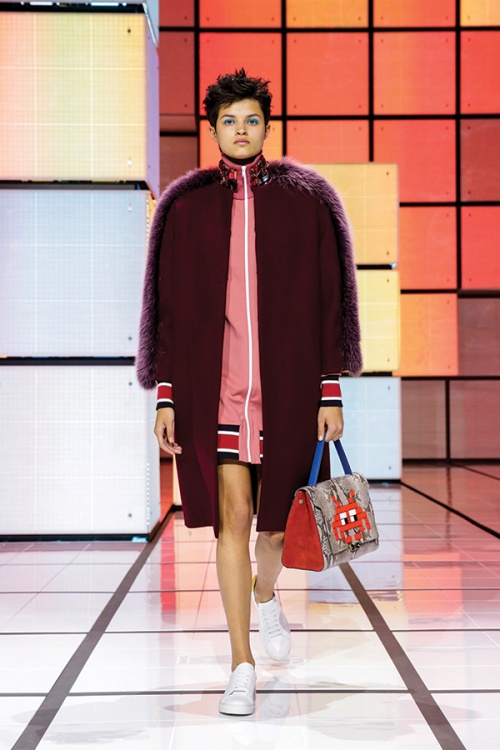 A look from the Anya Hindmarch autumn/winter runway show featuring pixel-themed items